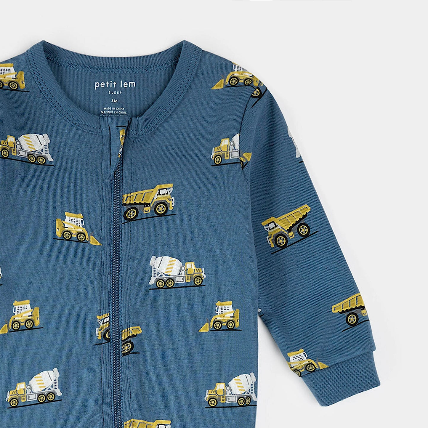 Footed Sleeper | Construction Truck Print on Cobalt Blue | Petit Lem