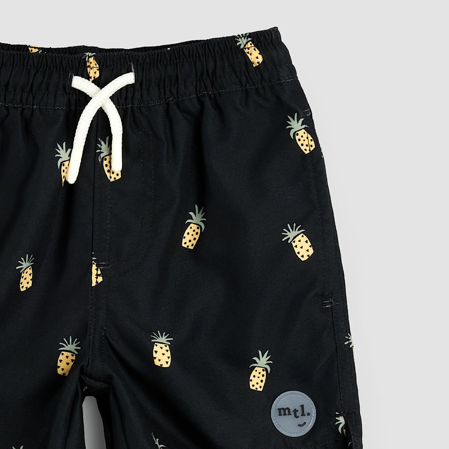 Pineapple Print on Black Swim Trunks | Miles The Label