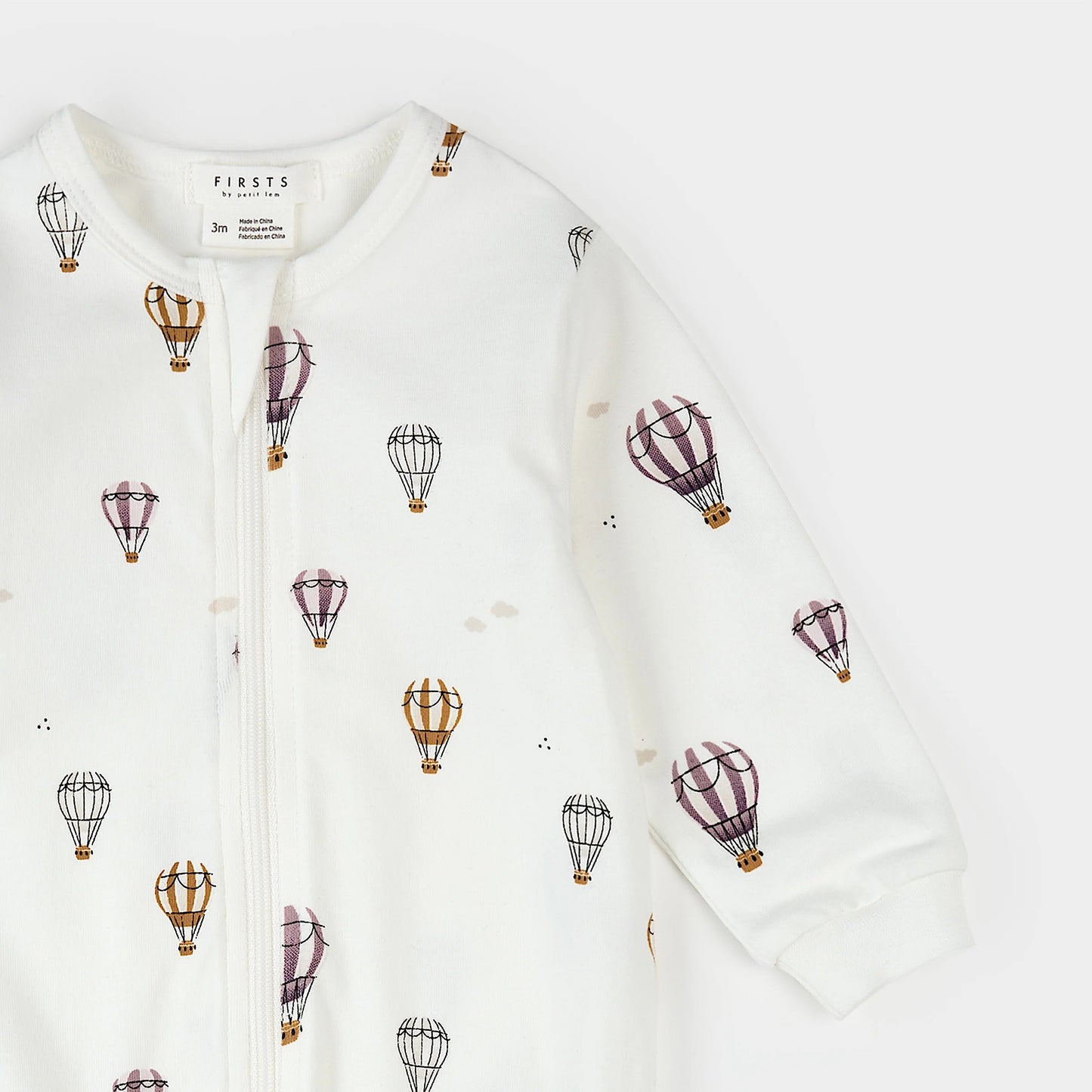 Hot Air Balloons Print on Off White Footed Sleeper | Petit Lem