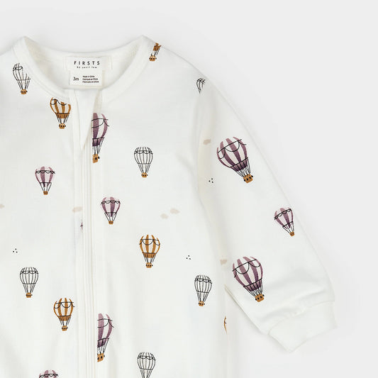 Hot Air Balloons Print on Off White Footed Sleeper | Petit Lem